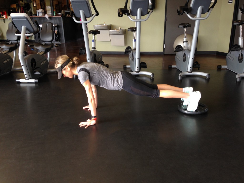 Plank walk with weights - 1 of 3 creative core exercises for balance and strength.
