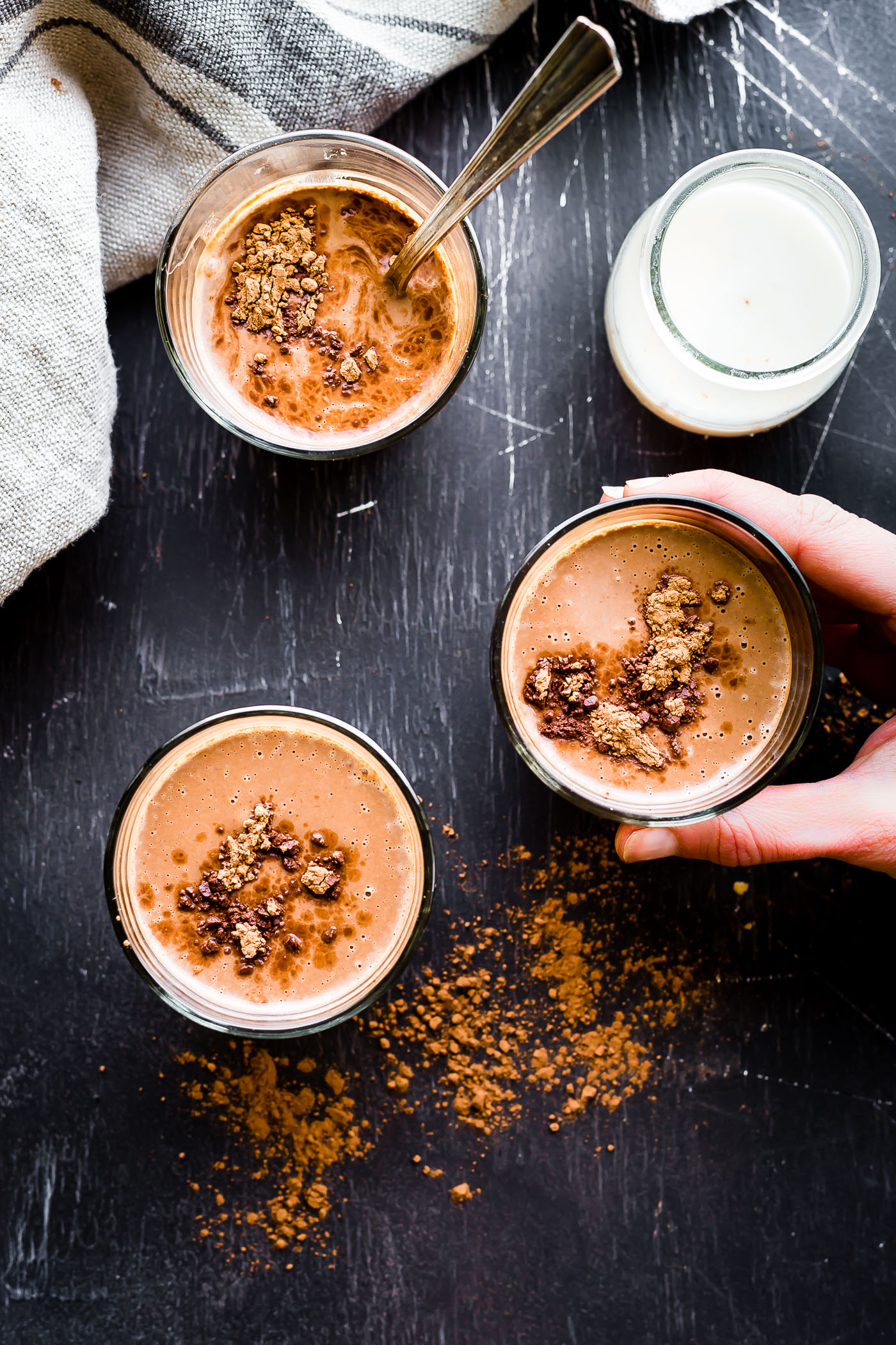 This low carb shake recipe, full of healthy coconut cream and unsweetened chocolate cocoa, will fuel your body for the day! The health benefits of this delicious vegan friendly, paleo shake recipe will keep you energized and nourished.
