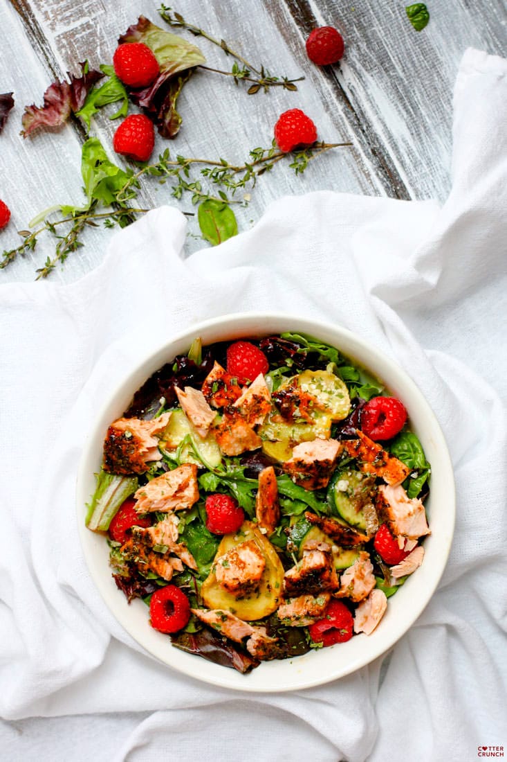 Salmon Salad Veggie Power Bowls with Raspberry and Balsamic Glaze. Finally, a salad this is packed with flavor, healthy fats, and amazing antioxidants! Zucchini, thyme, seasonal greens, grilled salmon, and raspberries make one POWERful and delicious combo. @cottercrunch