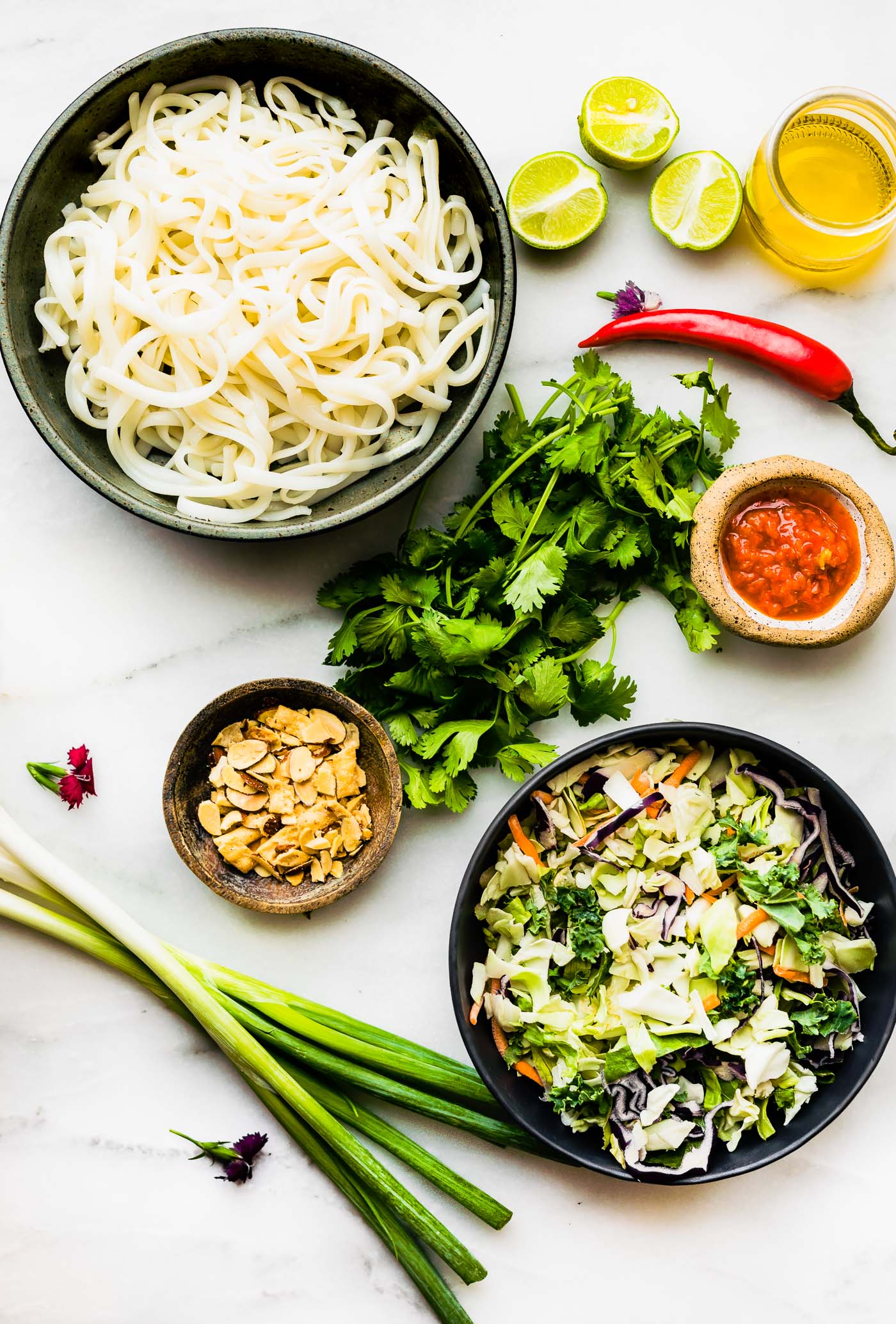 ingredients for rice noodle salad arranged together.