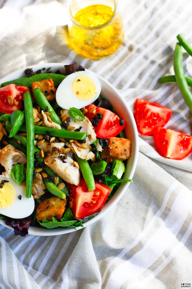 Salade Niçoise is one of the most refreshing summer salads to make! This Paleo version is full of flavor, healthy fats and nutrients, plus it's ready in 30 minutes. www.cottercrunch.com