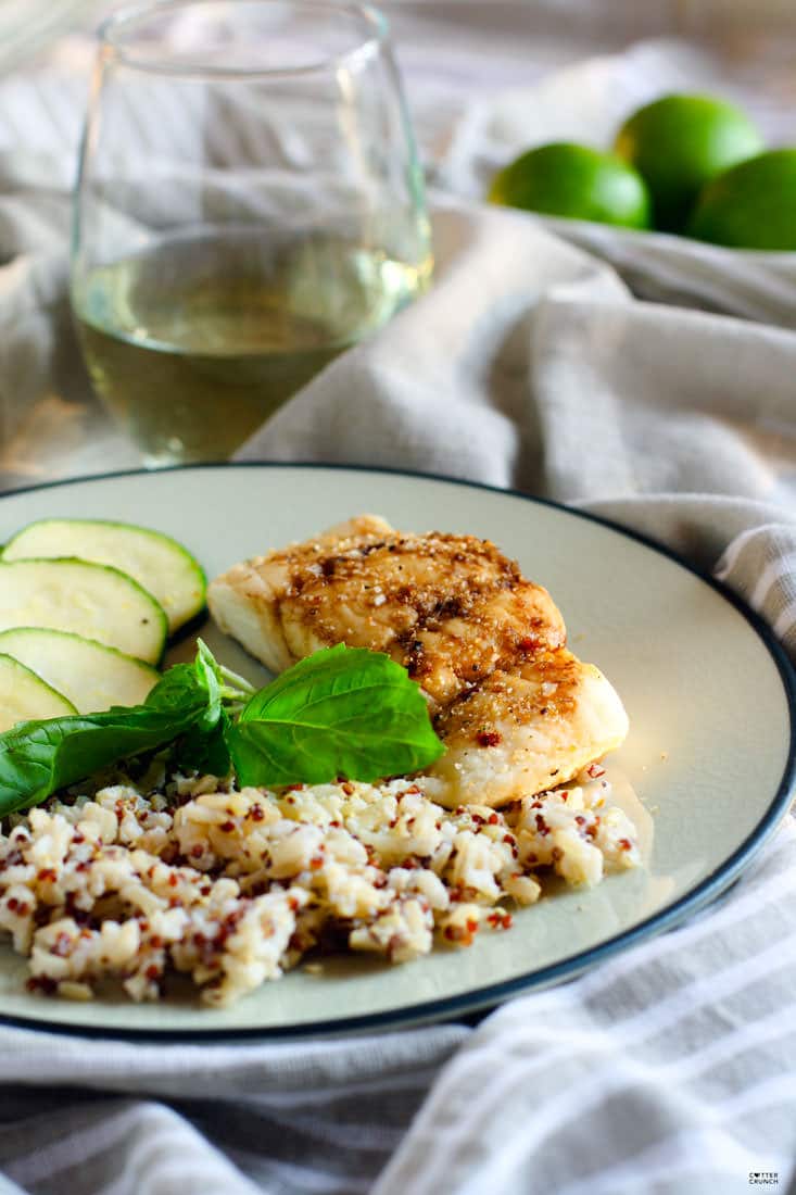 Gluten Free Ginger Lime Tamari baked Cod. It's light, flavorful, healthy, and ready in 15 minutes. A great Spring or Summer meal! Looking for more ways to season fish? Check out my list on cottercrunch.com