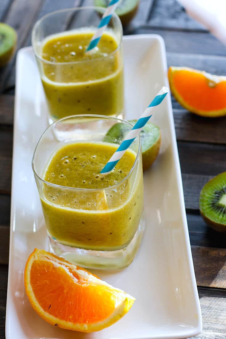 Homemade Orange Kiwi Citrus Electrolyte Slushy! Try this homemade citrus slushy drink to rehydrate and stay healthy during those hot summer months or with strenuous activity. A delicious drink packed with Vitamin C, Minerals, and Natural Sugars! This slushy combines the super powers over Orange, Kiwi, honey, Lime Juice, and sea salt to keep the body well tuned! Plus it's great for kids!