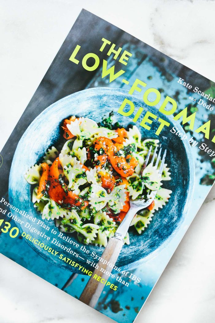 The Low-FODMAP Diet Cookbook cover against marble countertop