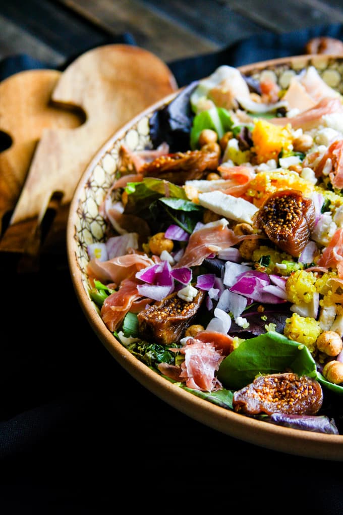 Gluten free fig, basil, and prosciutto Moroccan salad! This healthy cultural salad is far from boring. Perfect flavor combinations, including sweet and savory spices, and layers of dried fruit and vegetables. Great by itself or with a main protein like fish or chicken