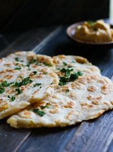 Grain Free Naan Bread with Cassava Flour! A simple and flavorful Middle Eastern bread made grain free and in 20 minutes or less! No oven required, just a skillet and few simple ingredients. Great with hummus, yogurt sauce, or by itself. Definitely a staple recipe you'll want to make over and over again!