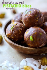 Paleo and Vegan friendly Dark Chocolate Coconut Pistachio bites! A crunchy, lightly sweet, delicious snack BITE that requires no baking! These little chocolate bites are naturally sweetened and packed healthy fats! @cottercrunch