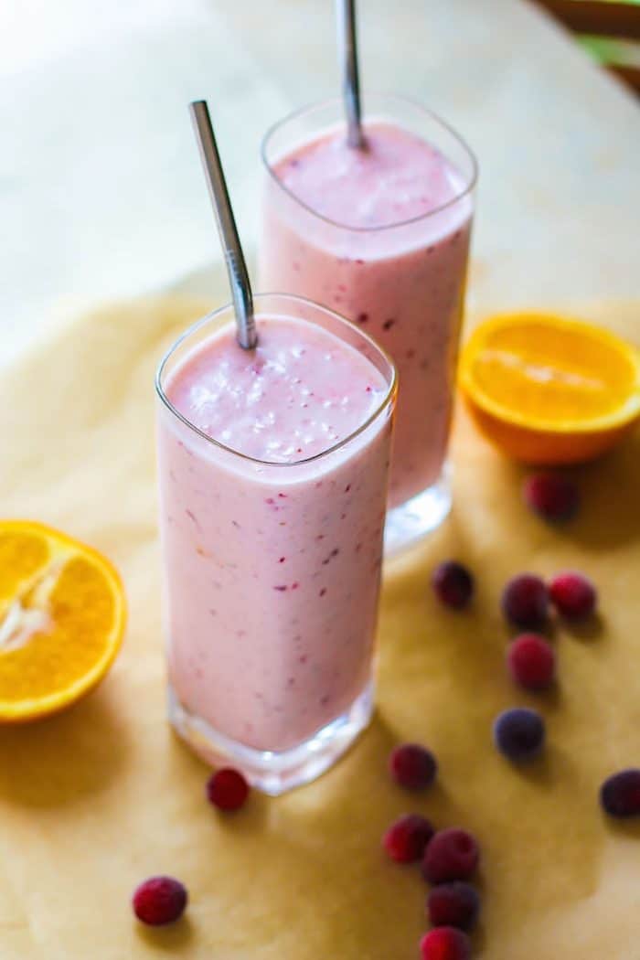 glasses of vegan immunity boosting frozen cranberry orange smoothies