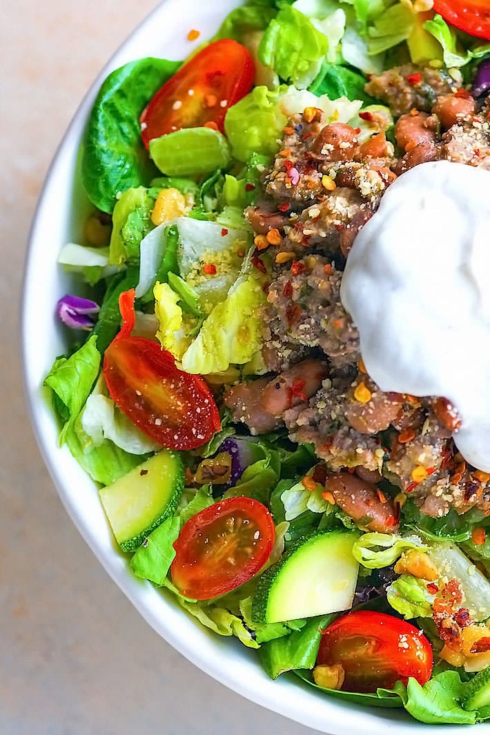 Gluten Free Crock Pot BBQ Taco Salad. A tasty Taco Salad with a little BBQ Bean and Beef kick! Easy to make in the crock pot, healthy, and perfect to use for multiple meals!