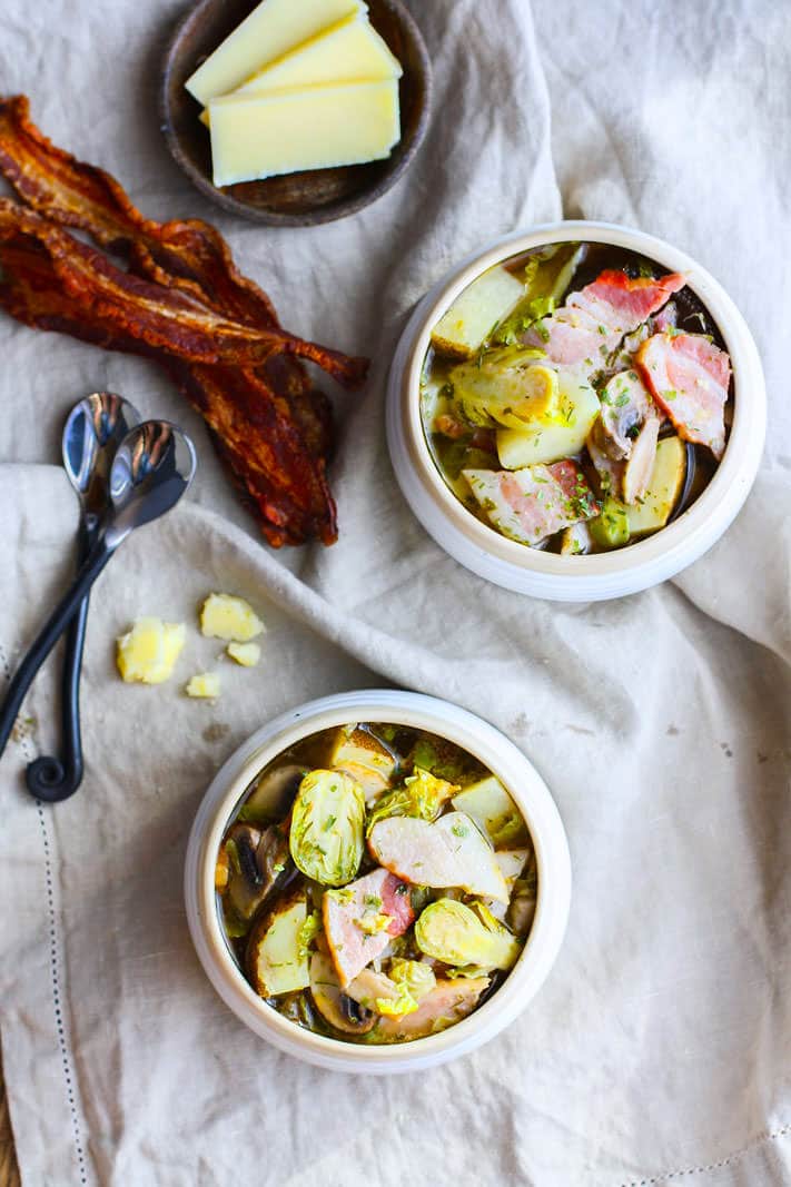 This smoked bacon veggie soup recipe is gluten free, grain free, Paleo friendly, and packed with simple, wholesome ingredients and flavor. Easy to make in a slow cooker or the oven! @cottercrunch