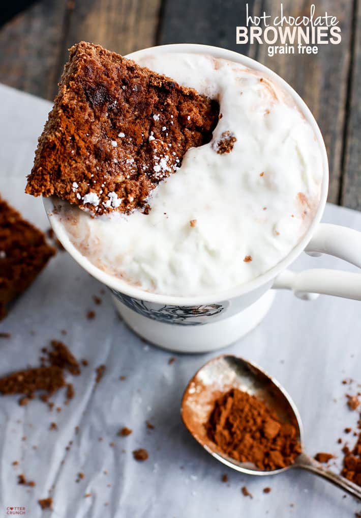 Grain Free Hot Chocolate Brownies! Basically hot cocoa in bar and super delicious! These grain free hot chocolate brownies can me made two ways; rich milk chocolate or lower sugar with dark chocolate and an egg free option! Either way, they are great to pair with cup of coffee, steamer, or hot chocolate of course! Ready in less than an hour. #cottercrunch