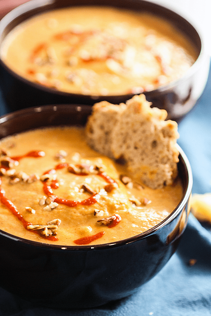 Bowls of Vegan Persimmon and Butternut Squash Soup