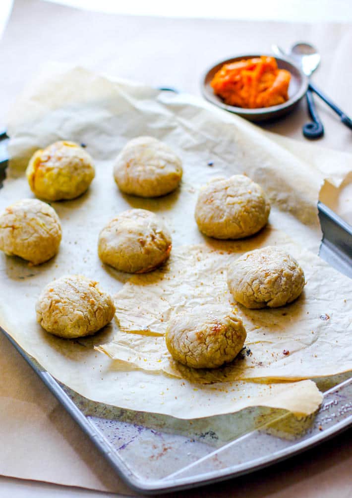 Healthy Pumpkin Stuffed Dough Balls; 2 Ways! An easy pumpkin filled snack that you can make in 30 minutes. Sweet or savory, you choose! All you need is your choice of milk, gluten free flour, and filling! Great for holidays, appetizers, snacks, and breakfast to go, etc. Paleo or Vegan Friendly.