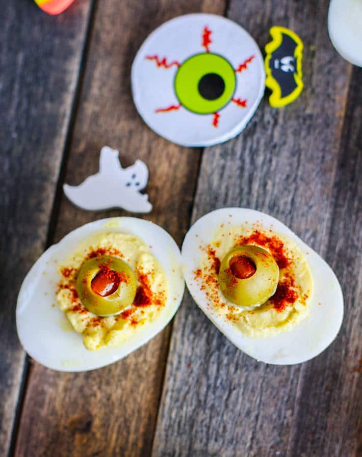 This tasty appetizer is commonly known, but my version is spooky for Halloween. Deviled eggs made to look like blood shot eyeballs! All you need are green olives, spices, eggs, and your favorite paleo condiment to mix in! Deviled egg eyeballs a favorite with the kids (and adults) at Halloween parties but also easy to make and healthy! Recipe -- http://bit.ly/eggeyeball
