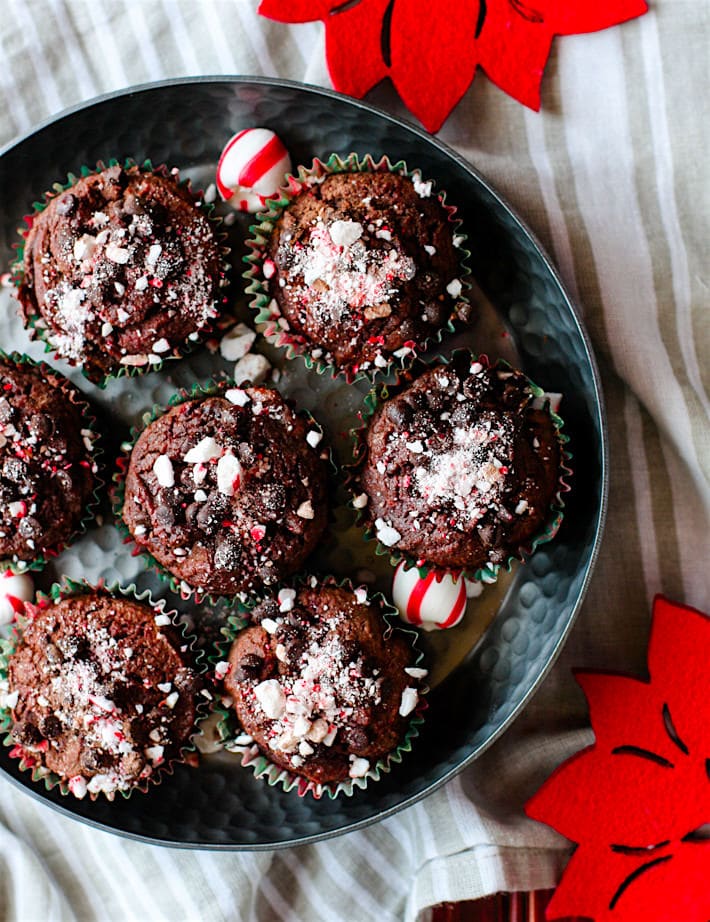 Dark Chocolate Peppermint Muffins with Soothing Peppermint oil! These chocolate peppermint muffins are not only grain free, but a healthy and festive way to enjoy breakfast or dessert. Plus they are a perfect pair for your coffee or hot chocolate, rich dark chocolatey flavor and hints of peppermint. A must make during winter or holiday baking time! Dairy free option as well.