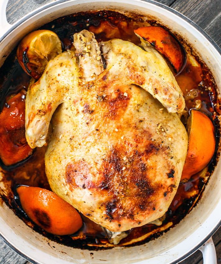 Gluten free One-pot Orange Honey Garlic Roasted Chicken. The sweet and savory orange sauces makes this roasted chicken so moist and flavorful. It's easy to make in the dutch oven and a total crowd pleaser for family or holidays! Paleo and dairy free! 