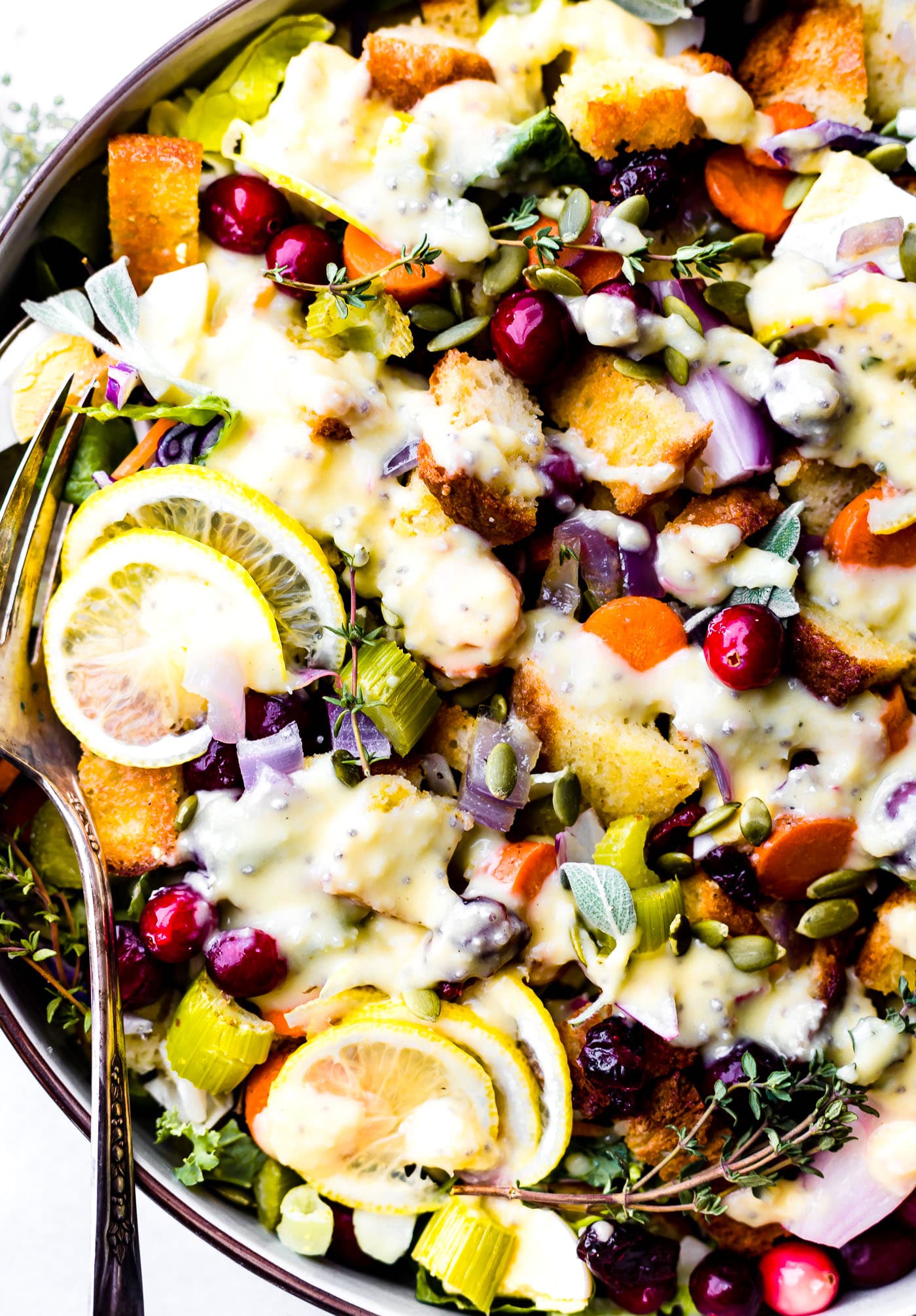 Gluten Free Stuffing Salad with Warm Onion Dressing! A lightened up Thanksgiving side dish that quick to make and flavorful. A Dairy free, easy, healthy gluten free stuffing recipe!