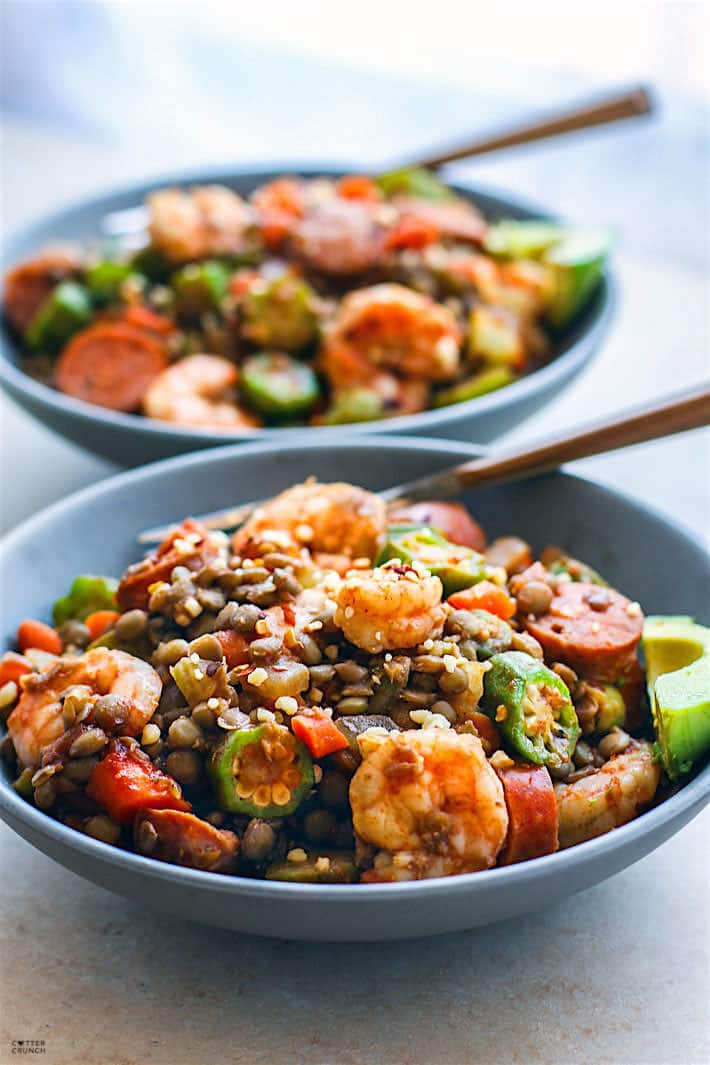 One Pot Shrimp Jambalaya Lentil Bowls! A grain free Healthy Southern Food Mash up! A fun and healthy twist on classic Jambalaya and shrimp gumbo combined together to make one amazing southern comfort bowl. Packed full of veggies, lentils, and protein. It's an easy one pot meal for a family, potlucks, or even to make ahead and freeze for later!