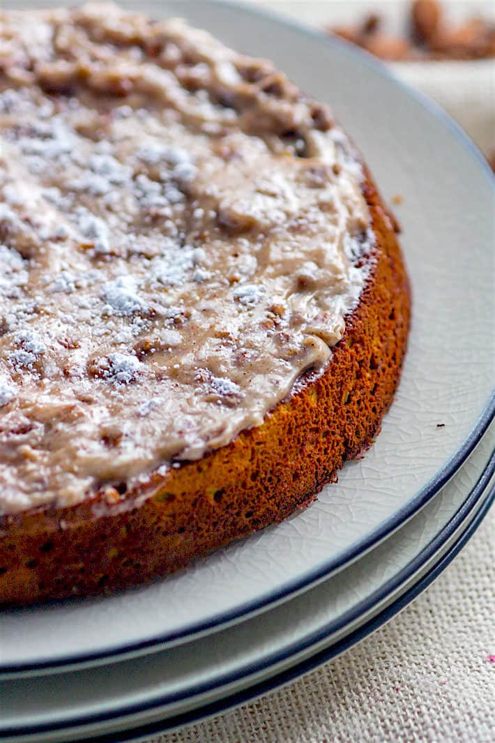 Grain Free White Chocolate Spiced Almond Cake! A healthy holiday twist on the classic almond cake! Cinnamon Spiced almond cake with melted white chocolate and a cinnamon cream cheese topping.Taste so decadent but is actually pretty healthy and easy to make.