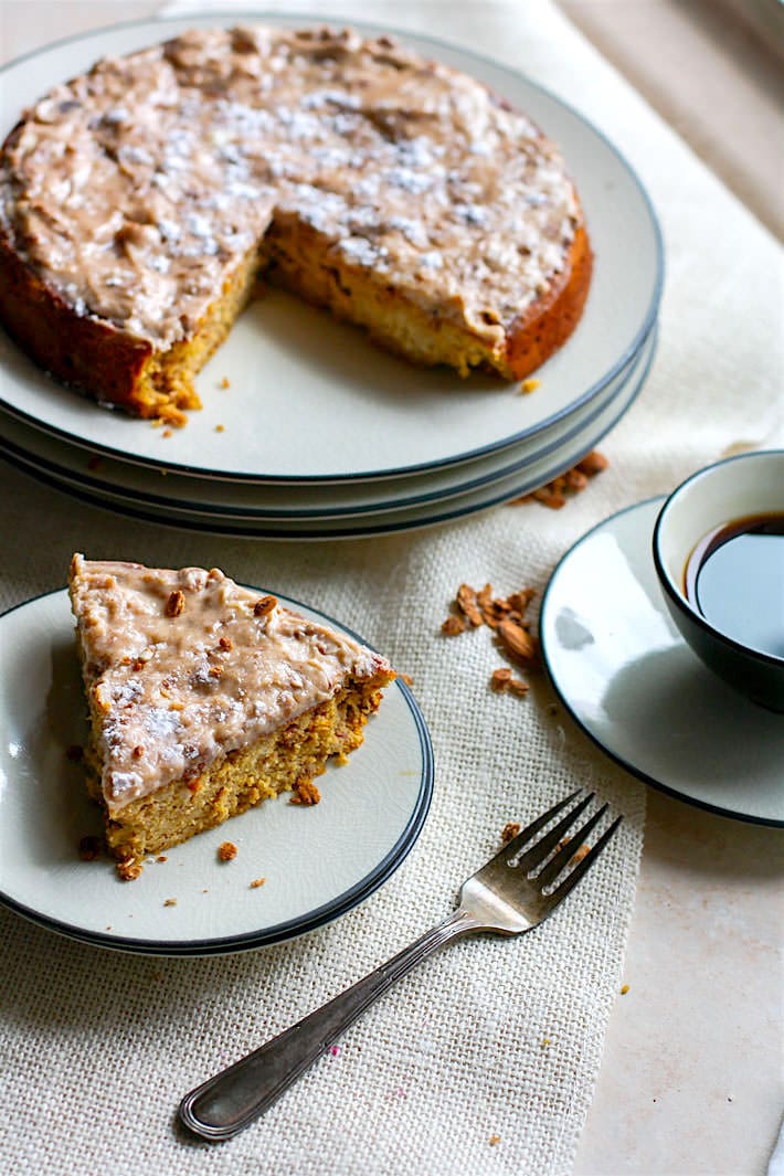 Grain Free White Chocolate Spiced Almond Cake! A healthy holiday twist on the classic almond cake! Cinnamon Spiced almond cake with melted white chocolate and a cinnamon cream cheese topping.Taste so decadent but is actually pretty healthy and easy to make. A perfect moist cake recipe for those looking to enjoy gluten free desserts.