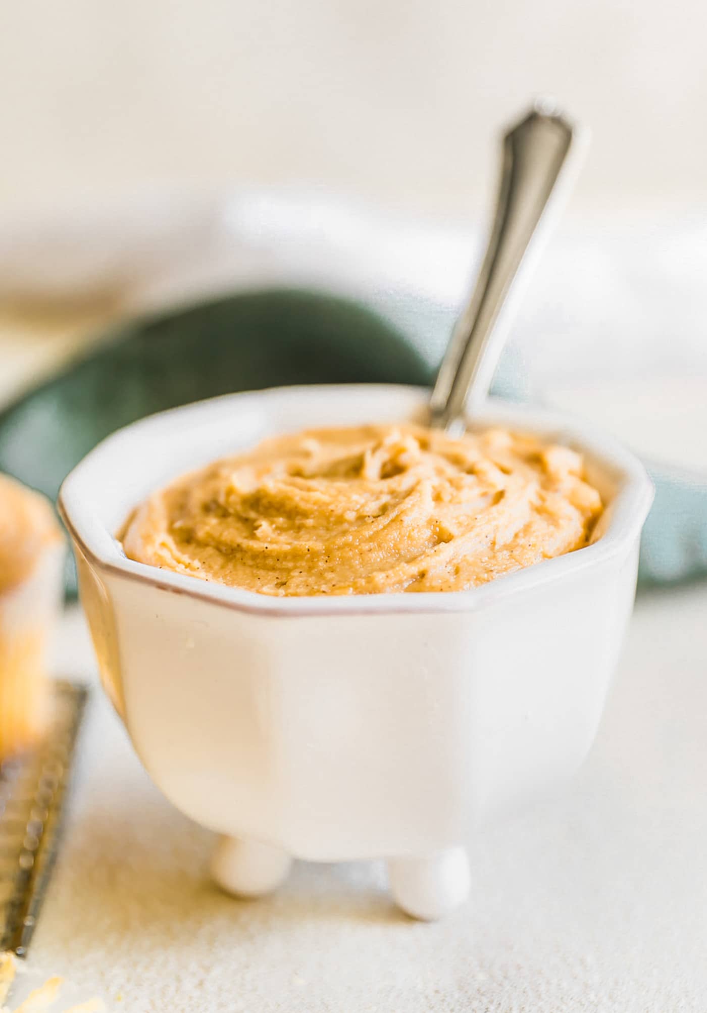 Maple cashew cream cheese frosting in white bowl