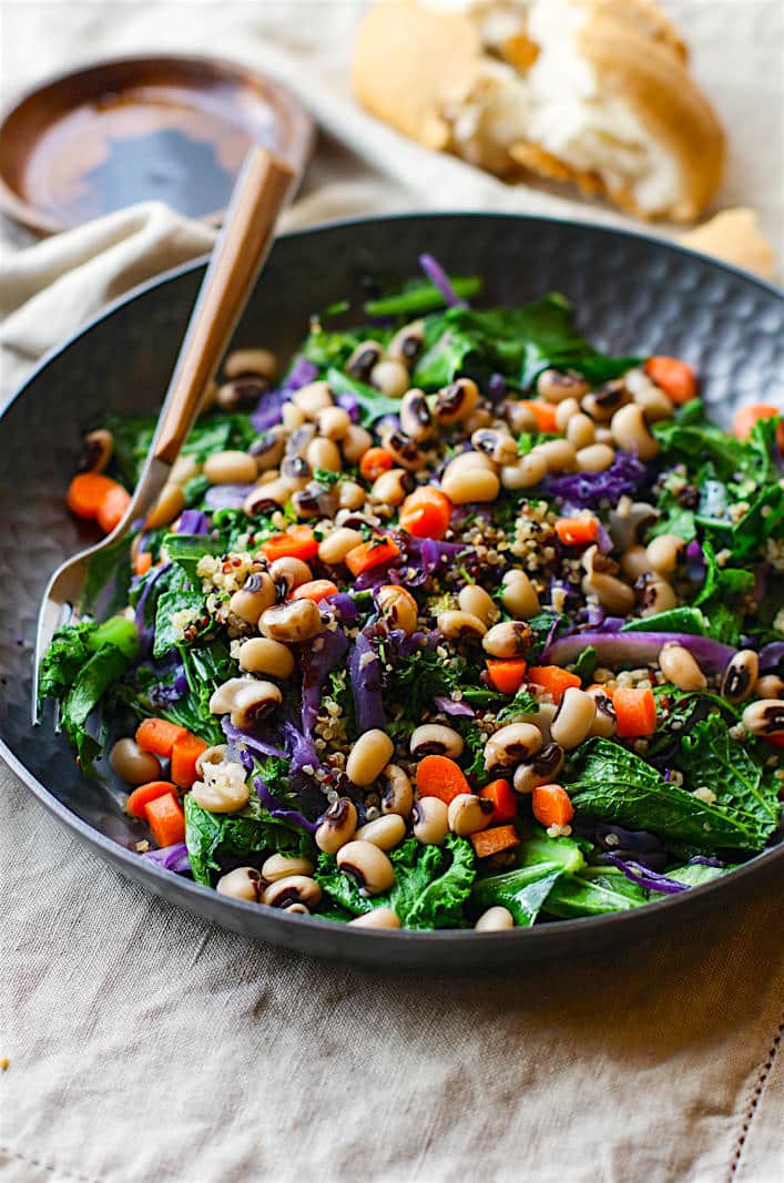 Power up the new year with this Vegan Rainbow Power Greens Salad with Black Eyed Peas. A healthy gluten free power greens salad packed with lucky black eyed peas and super nutrients.