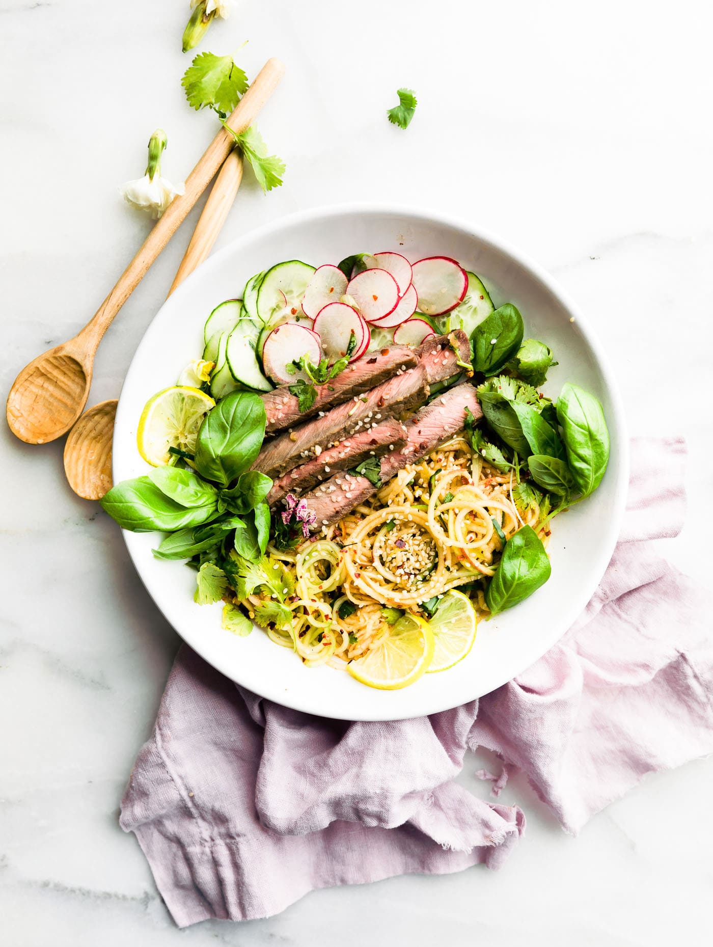 paleo apple kimchi salad with beef in a bowl