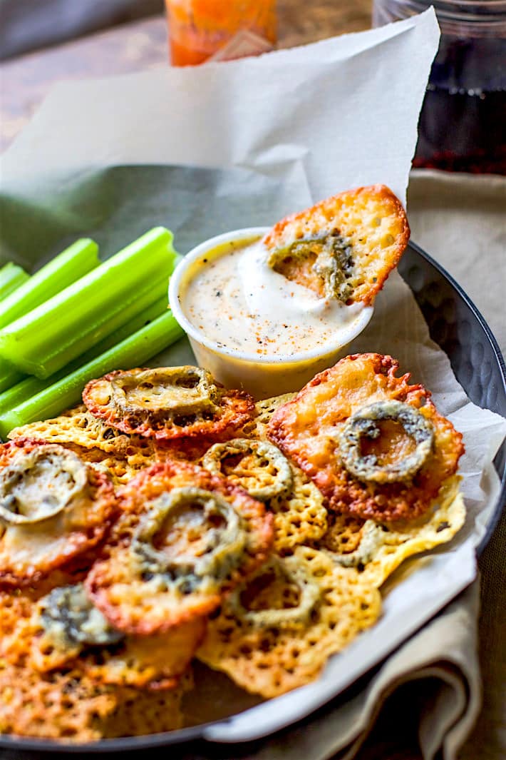 platter of homemade baked cheese crisps with jalapenos on top