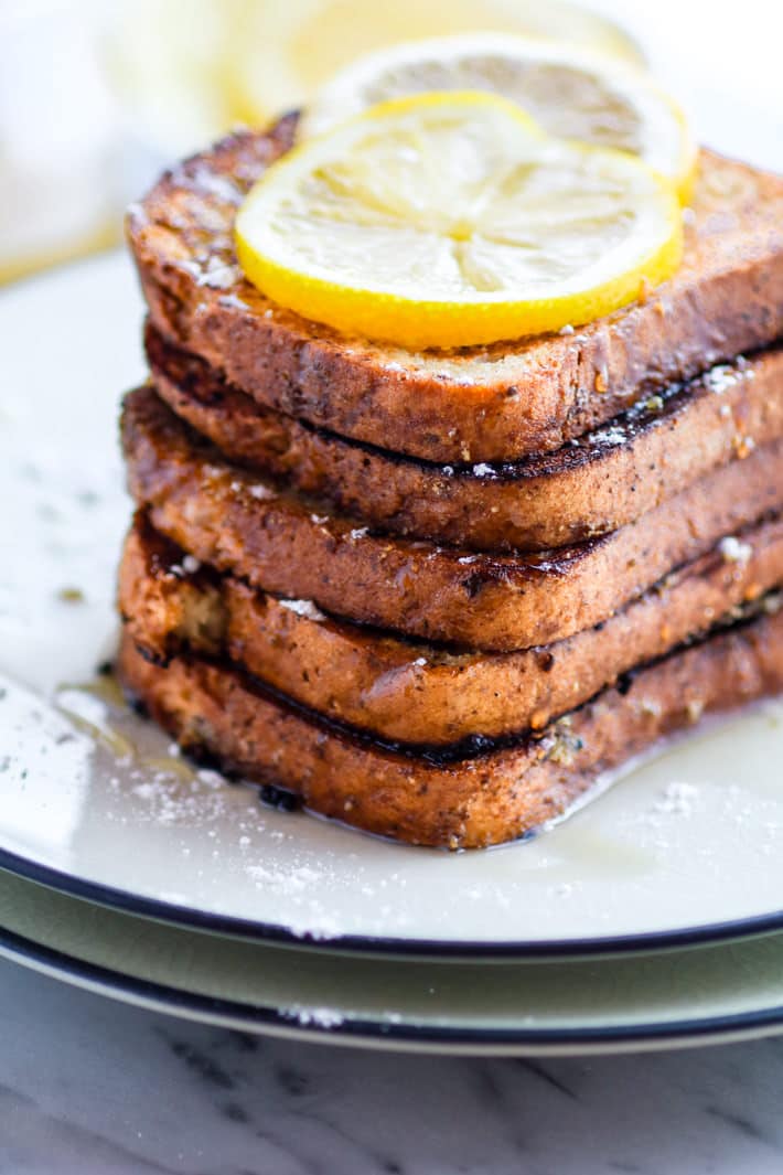 Honey Lemon Vanilla Gluten Free French Toast. Simple yet delicious flavors, easy to make, no eggs needed, and vegan Friendly! This Gluten Free French Toast breakfast is a hit for weekend brunch or for kids. Perfect for freezing and making ahead too. But the sauce.. that honey lemon cream sauce... it makes this FRENCH TOAST SHINE!