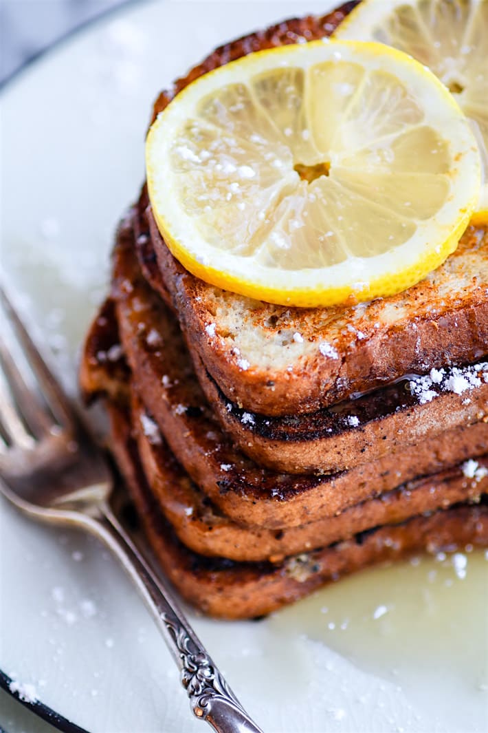 Honey Lemon Vanilla Gluten Free French Toast. Simple yet delicious flavors, easy to make, no eggs needed, and vegan Friendly! This Gluten Free French Toast breakfast is a hit for weekend brunch or for kids. Perfect for freezing and making ahead too. But the sauce.. that honey lemon cream sauce... it's a must!