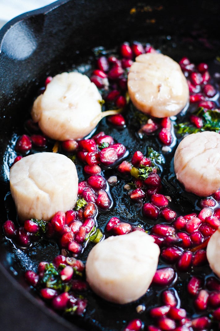 Fake your way FANCY with this EASY Maple Balsamic-Glazed Scallop Recipe with Pomegranates! All you need is one pan and 10 minutes. A Healthy Maple Balsamic-Glazed Scallops recipe so perfect for a date night in or to impress guests. Heck, just hog them for yourself! They are that good and simple! Paleo friendly of course.
