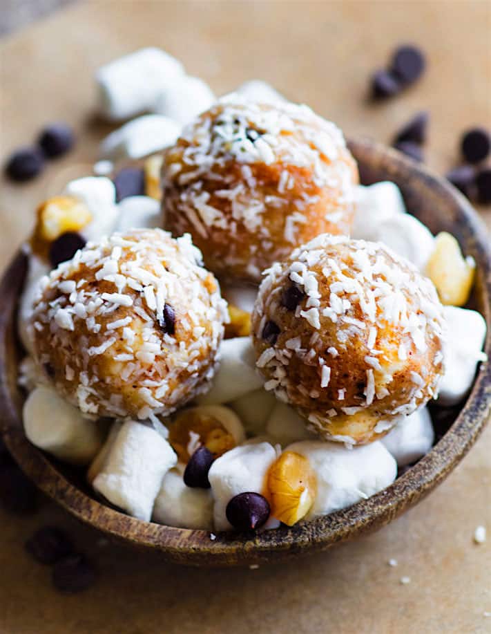 Gluten Free and Dairy Free Coconut Rocky Road Peanut Butter Bites. Healthy no bake peanut butter bites that are packed with a rocky road coconut filling!