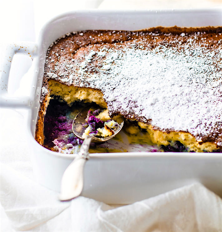 Easy Paleo Blueberry coconut soufflé bake. Rich and creamy yet also airy and lightly sweet! This paleo blueberry coconut soufflé bake is a twist on the classic French dish. Feeds many, easy to make, simple ingredients, and so delicious! great for brunch or dessert!
