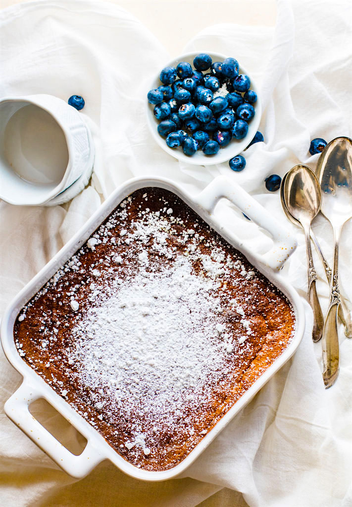 DREAMY Paleo Blueberry Coconut Soufflé Bake! Rich and creamy yet also airy and lightly sweet! This paleo blueberry coconut soufflé bake is a twist on the classic French dish. A Low Carb, Healthy, Fool Proof souffle that's great for a dessert or brunch! A custard like center but still light and flavorful. Feeds many, simple ingredients, and so delicious!