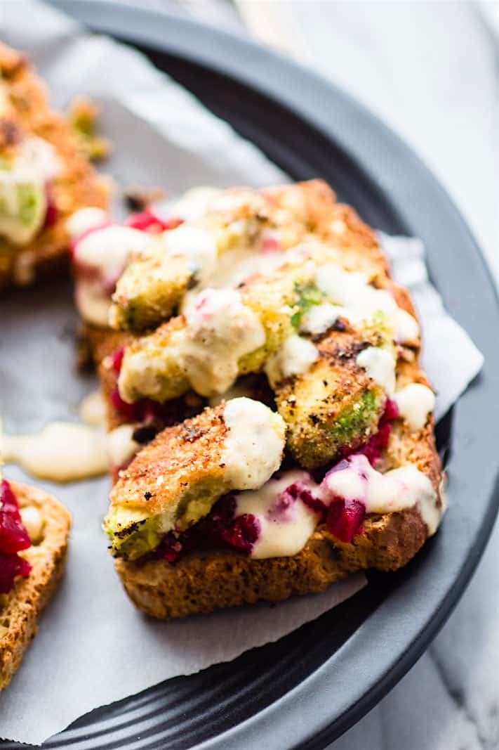 fried avocado and beets on toast