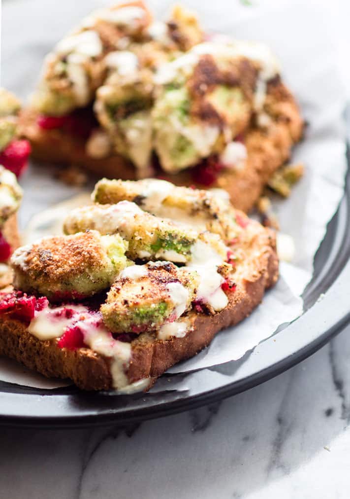 deep fried avocado and smashed beets on toast