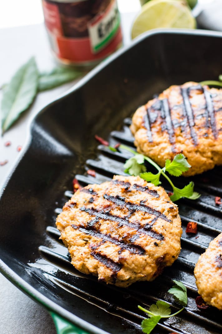 Grilled Adobo Chicken Burgers. A fusion of delicious Filipino and Mexican style adobo chicken flavors all mixed together and grilled up to make one TASTY chicken burger! These Chicken burgers are simple to make, healthy, gluten free, dairy free, and unreal GOOD! Perfect BBQ food if you ask me!