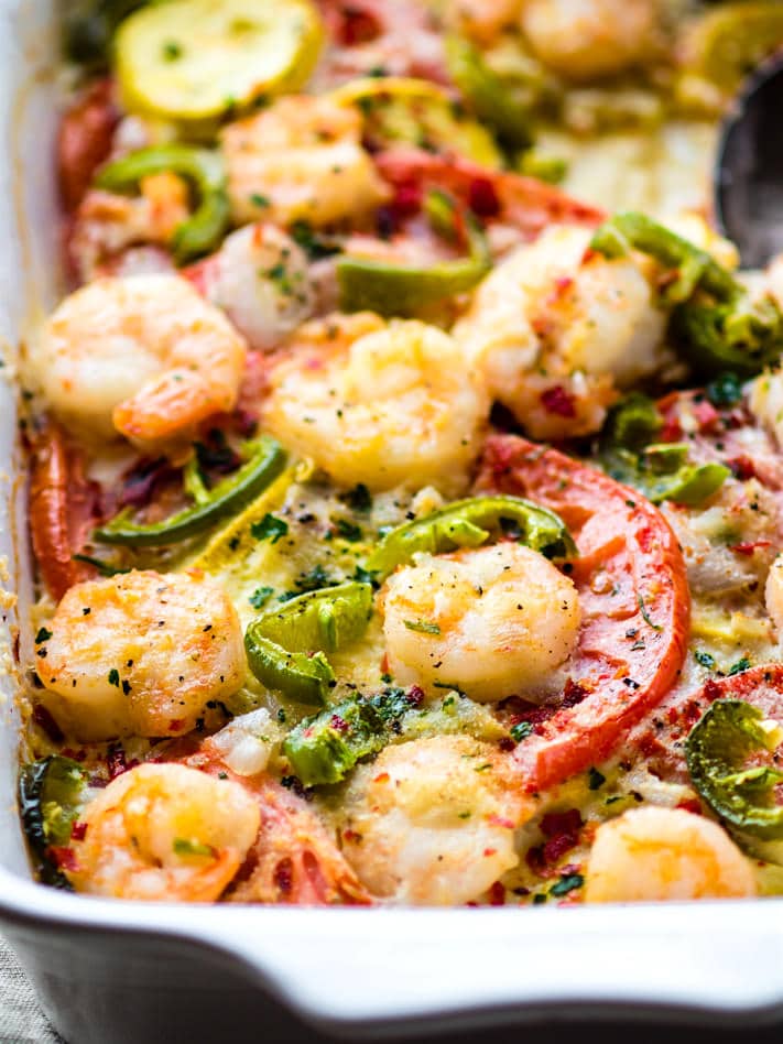 EASY Jalapeño Shrimp Veggie Bake! This Spicy Jalapeño Veggie bake is low carb, grain free, and simple to make in under an hour! Seasonal vegetables, lean protein, herbs, and spices all baked to perfection. A better for you gluten free VEGGIE bake/casserole that's a total crowd pleaser.
