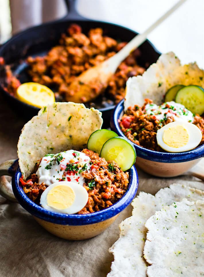 Gluten Free Turkish Style Savory Breakfast Bowls. Healthy spicy yet savory breakfast bowls packed with ground meat/sausage, herbs, spices, and a tangy yogurt topping! Great for breakfast, brunch, or dinner. Perfect with flatbread or crusty gluten free toast.
