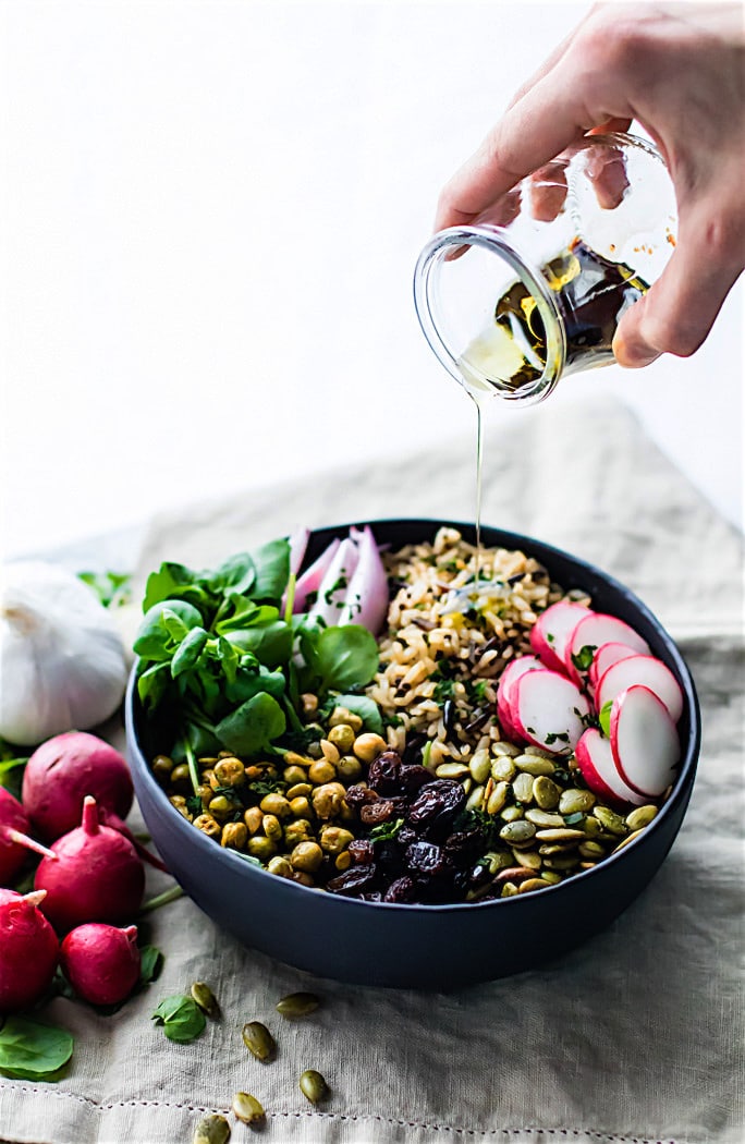 Garden Veggie Vegan Buddha Bowl! This wholesome gluten free Buddha bowl recipe is filled with superfood ingredients that nourish you and keep you healthy!
