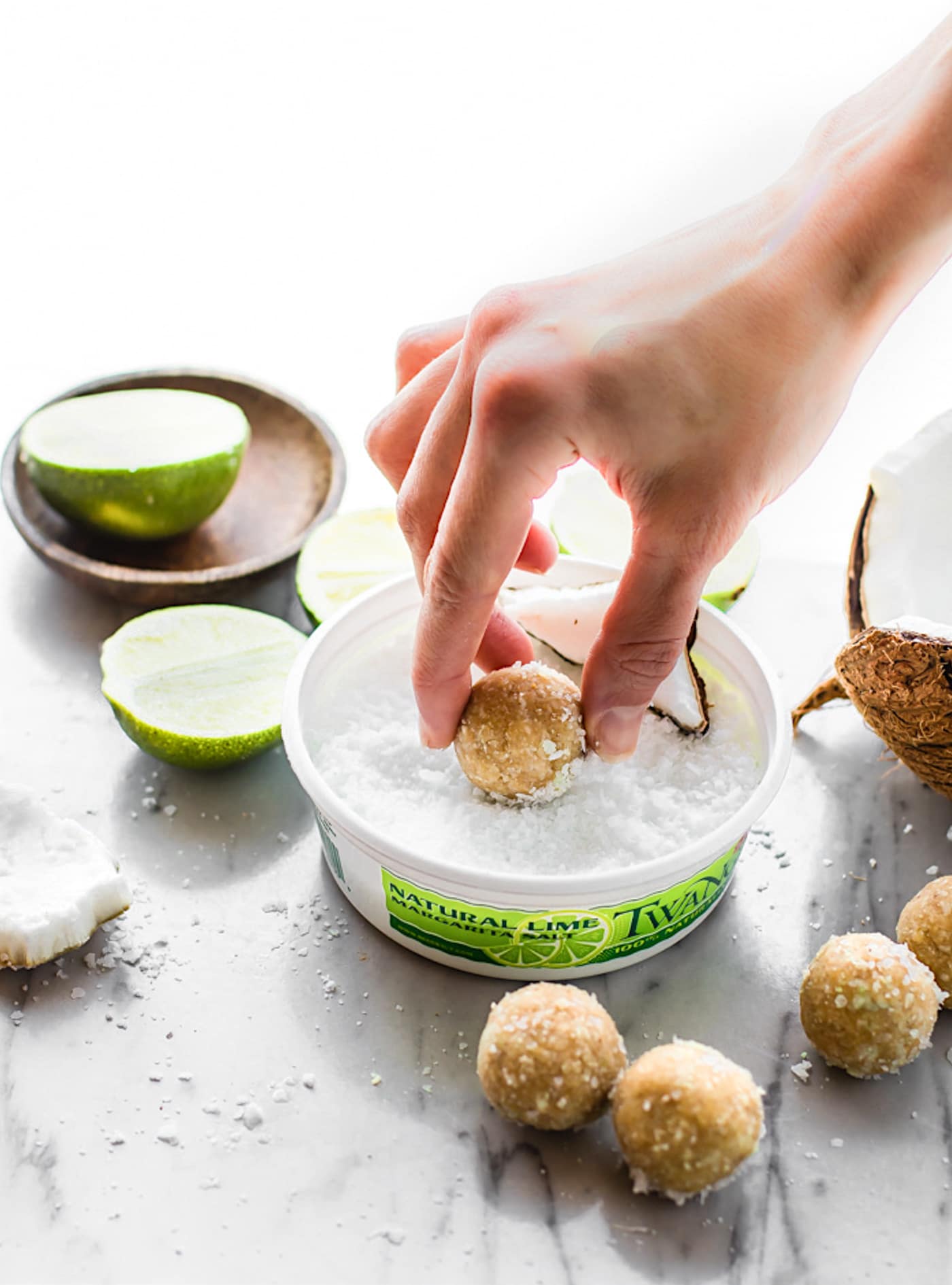 No Bake Coconut Margarita Bites! Super simple no bake coconut margarita treats in dessert bite form! These bites are naturally gluten free, paleo friendly, and vegan! Bites that actually taste like a frozen margarita with natural lime and coconut flavors. #vegan #paleo #nobake