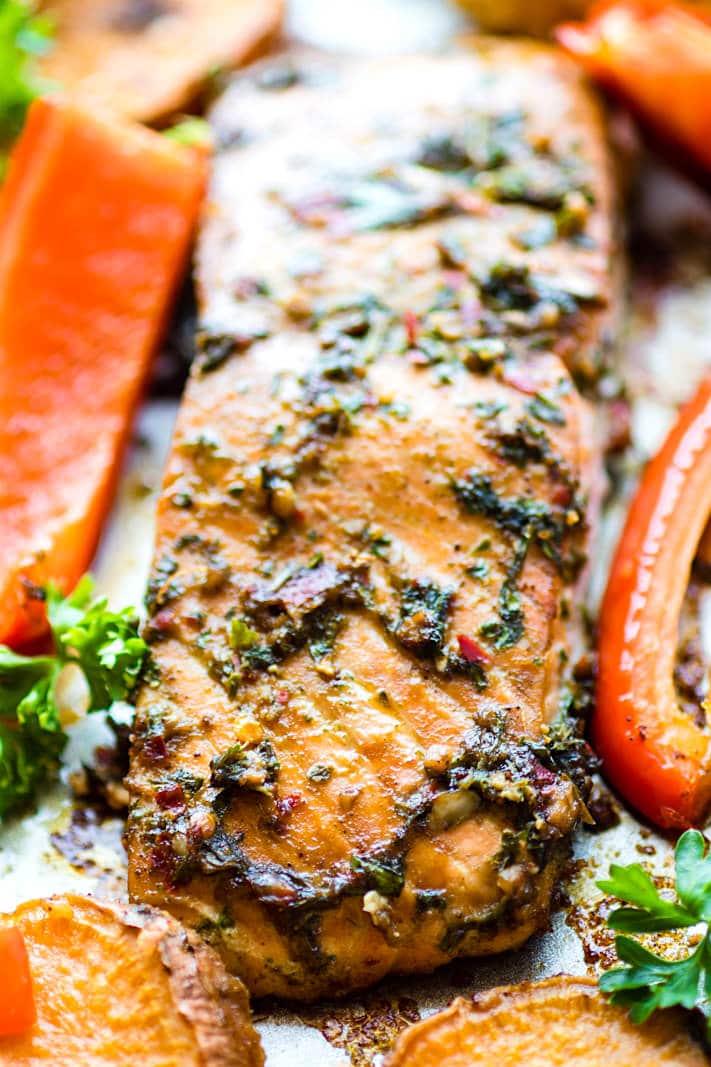Easy Sheet Pan Jerk Salmon with Veggies! Flavorful Jerk salmon recipe with seasonal veggies baked all on one sheet pan. A wholesome protein packed one pan meal that nourishes the whole family! Not to mention EASY cleanup! Yes!