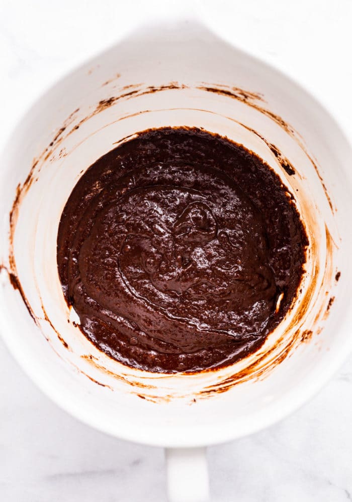 chocolate almond flour cake batter in white mixing bowl