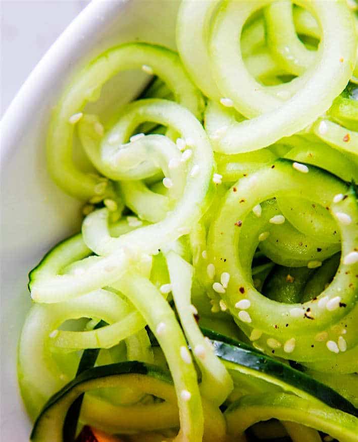 Zesty Mango Spiralized Cucumber Salad. Grab your spiralizer and make this light to Vegan Spiralized Cucumber Salad. Plus 4 other Spiralizer Salad favorites to try!