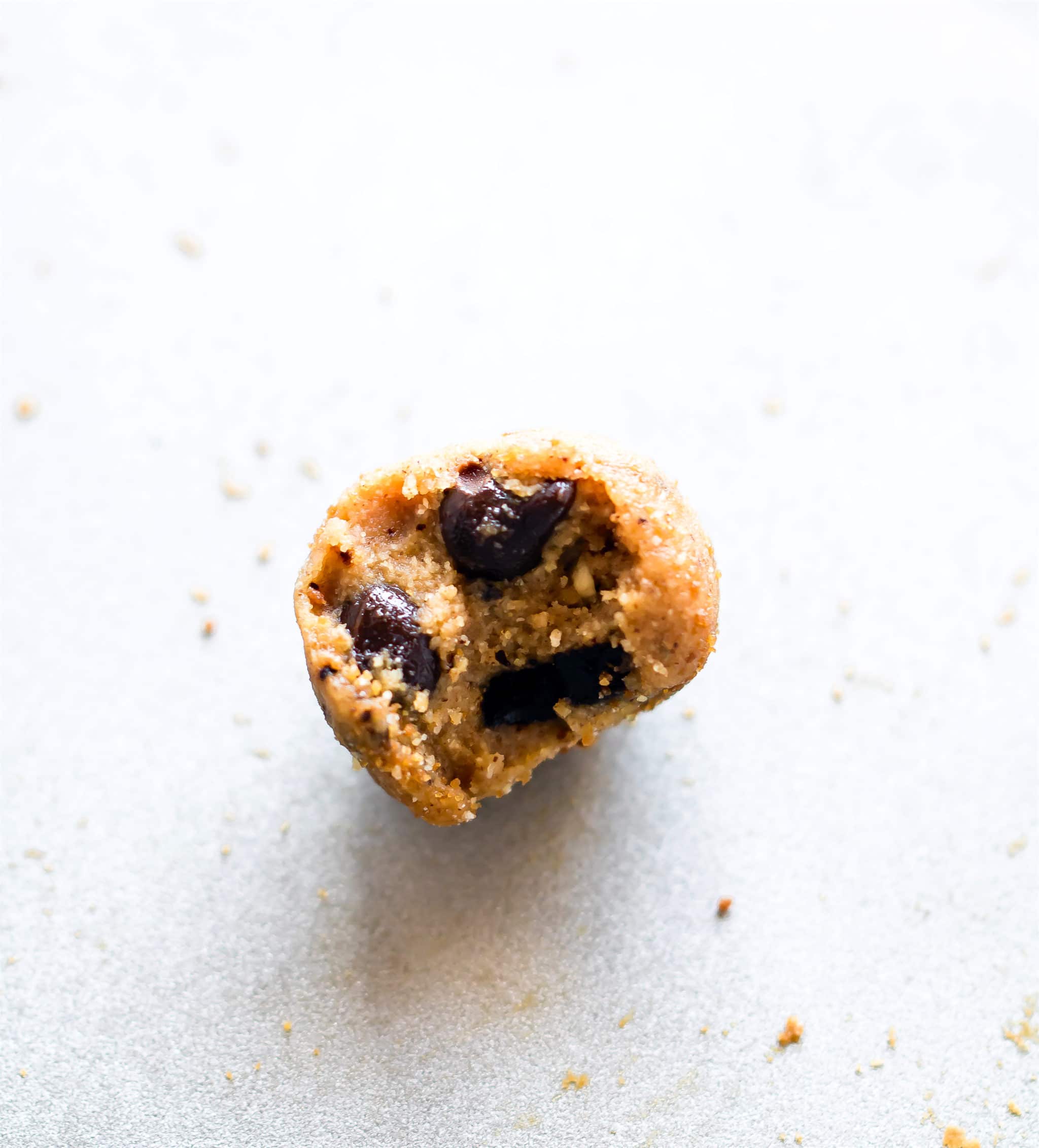 a paleo-friendly no-bake snack bite with a bite taken out of it