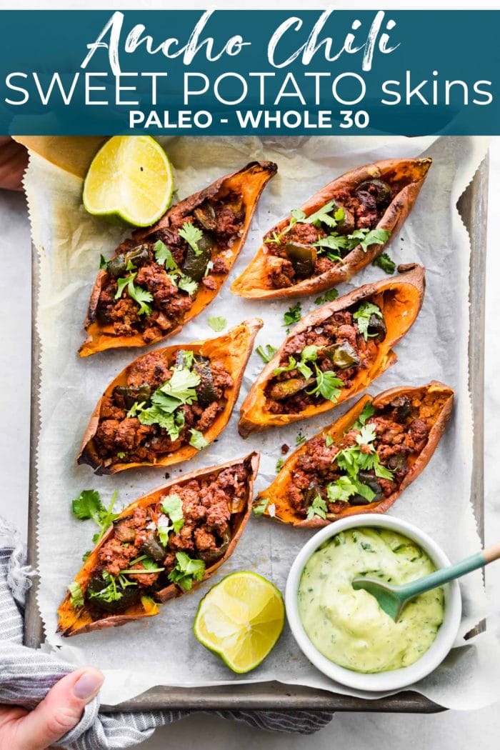 ancho beef stuffed in sweet potato on a platter with cilantro and dip