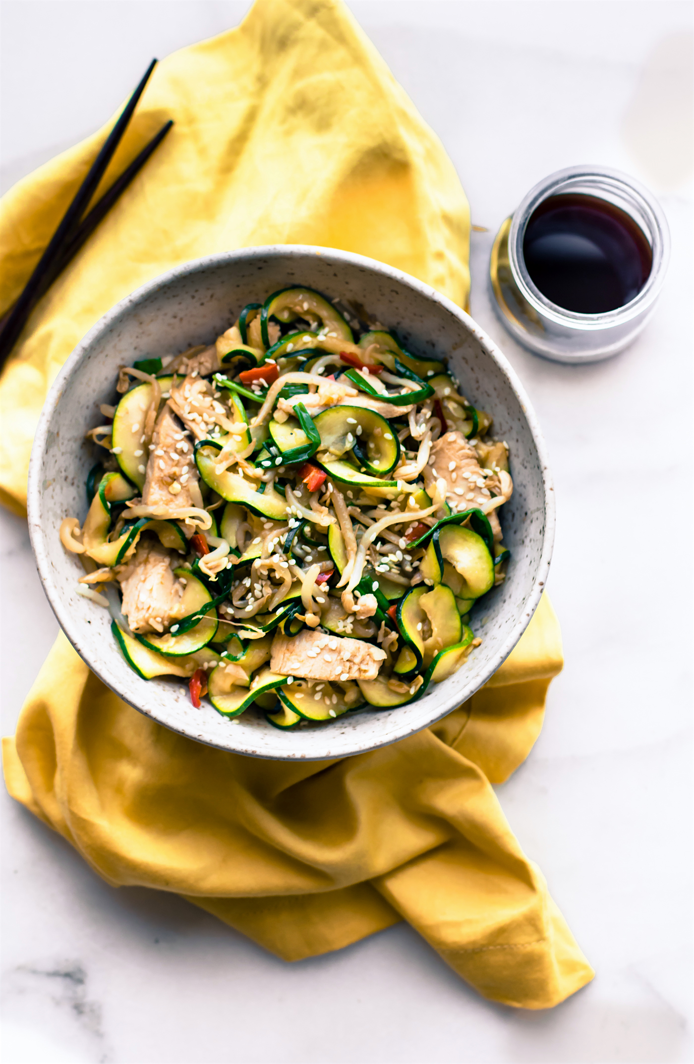 healthy turkey stir fry made with zucchini noodles and leftover holiday turkey and veggies