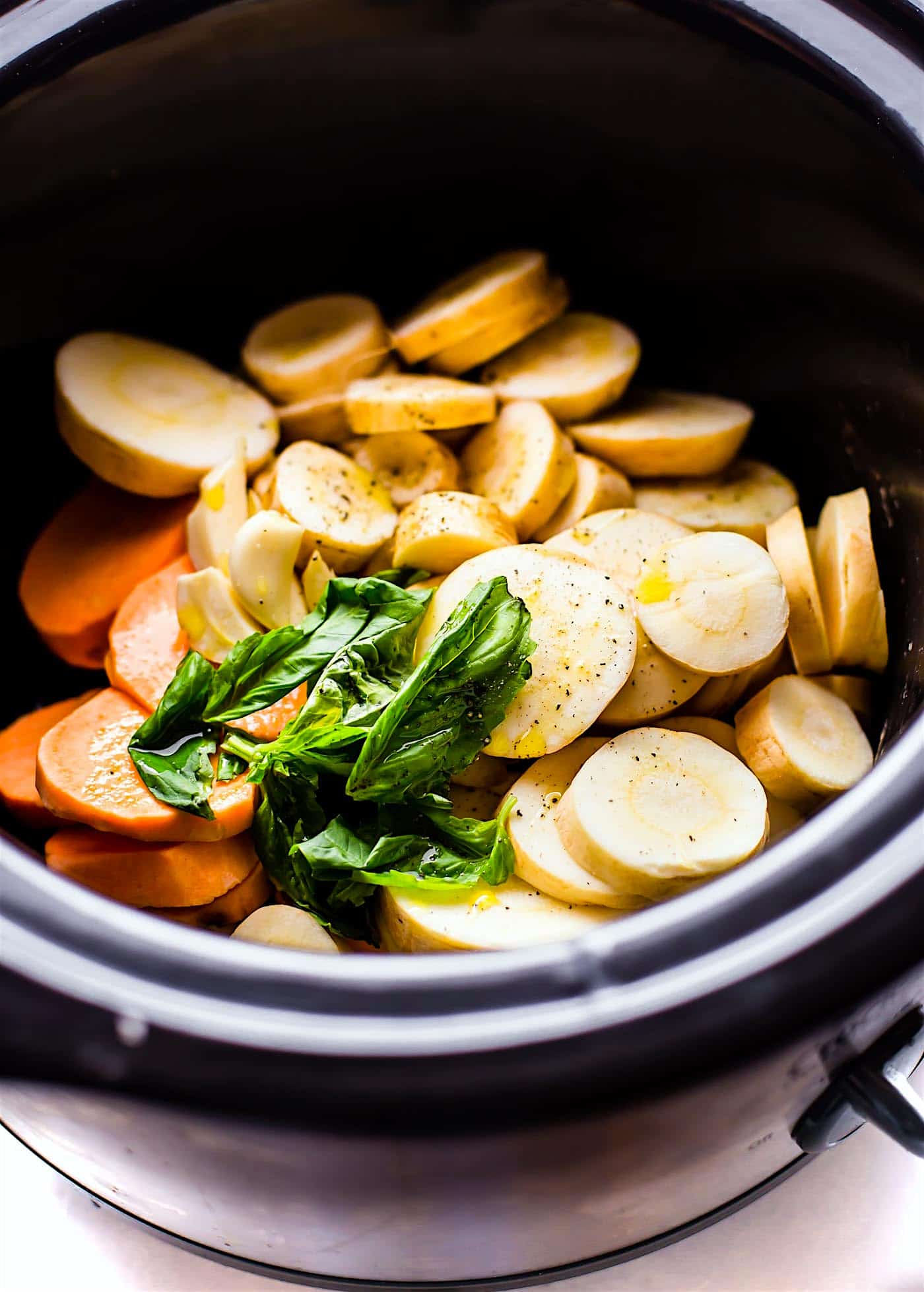 vegetables in a slow cooker to make Whole30 soup