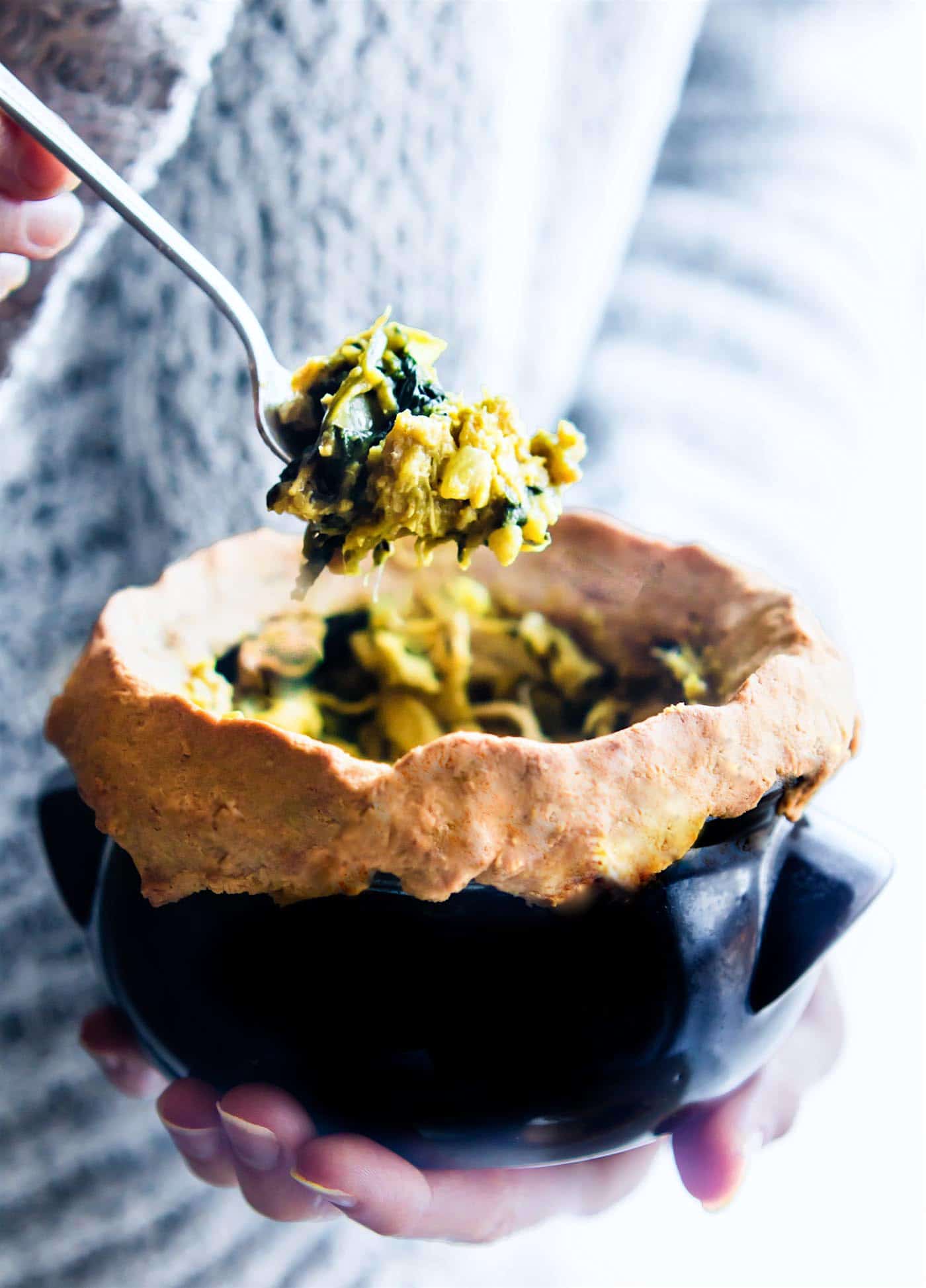 Gluten Free Chicken Curry Pot Pies filled with creamy spinach, curried lentils, and roasted chicken. These gluten free chicken curry pot pies are quick to make for several mini pot pies or one! A chicken curry filling that will warm the body and soul. Dairy Free, healthy, delicious! 