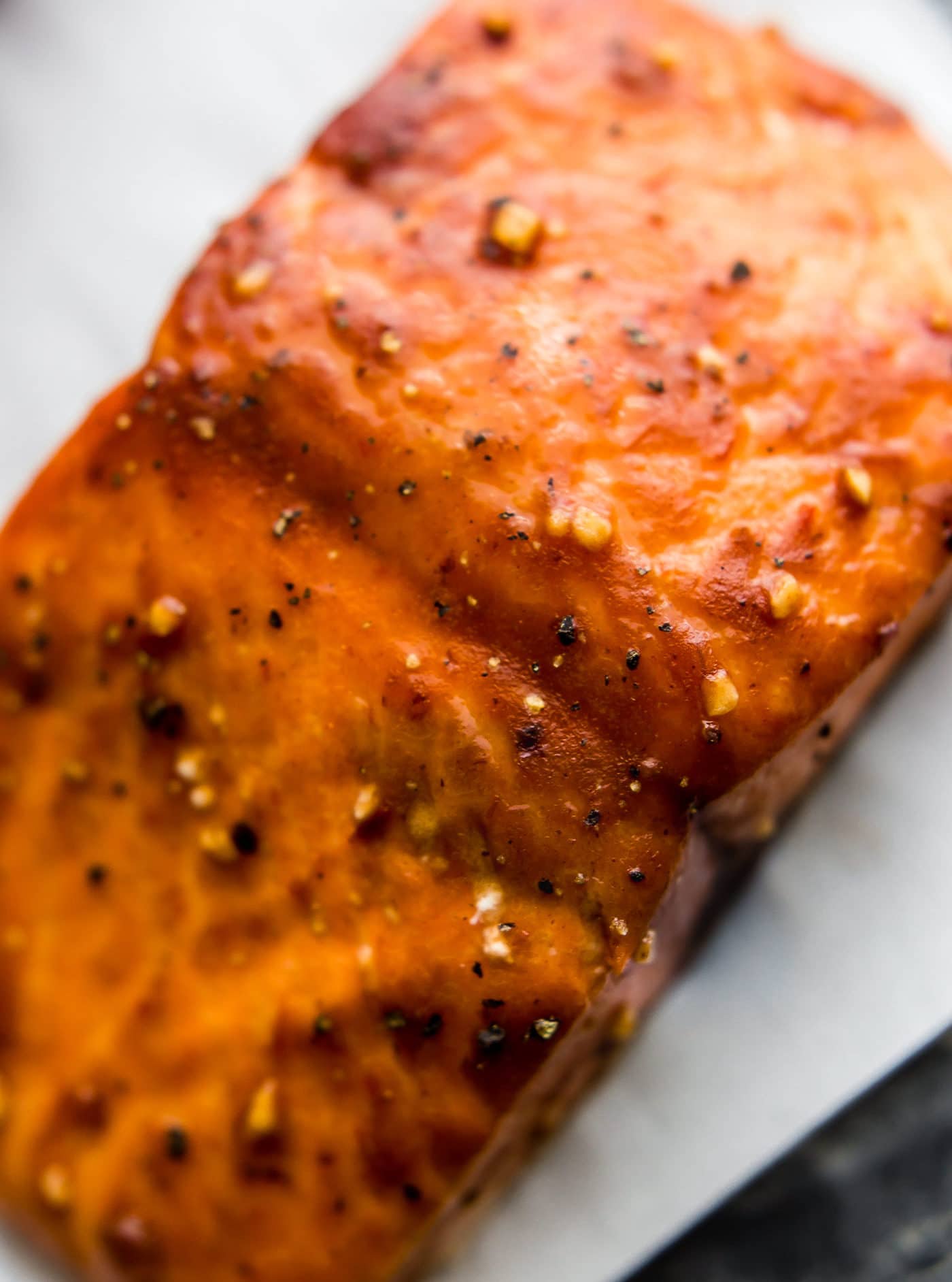 Close up view bbq salmon fillet on white background.
